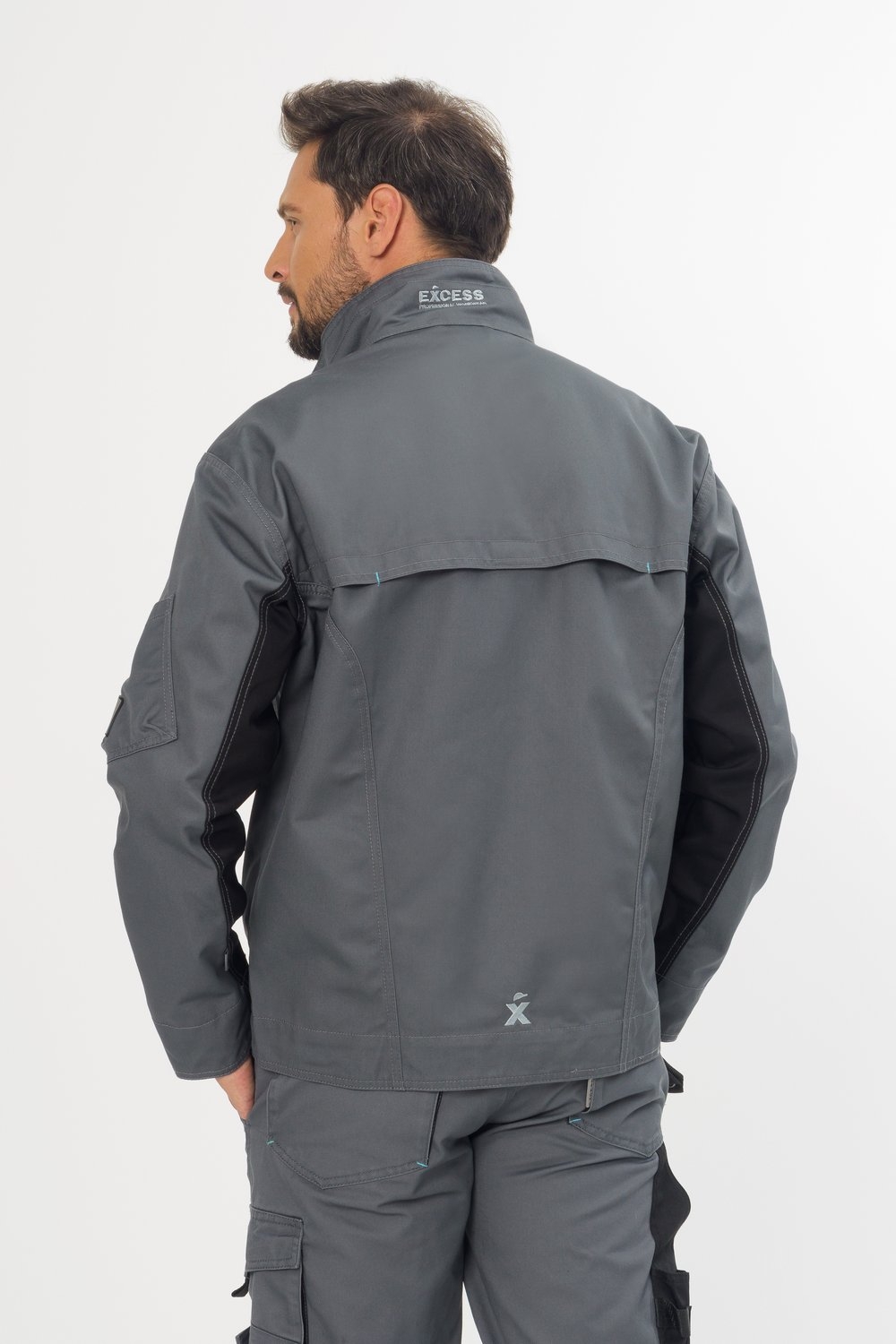 Rückansicht graue CHAMP Arbeitsjacke – Sportliche Arbeitsjacke mit verdecktem Reißverschluss und vielen praktischen Taschen.